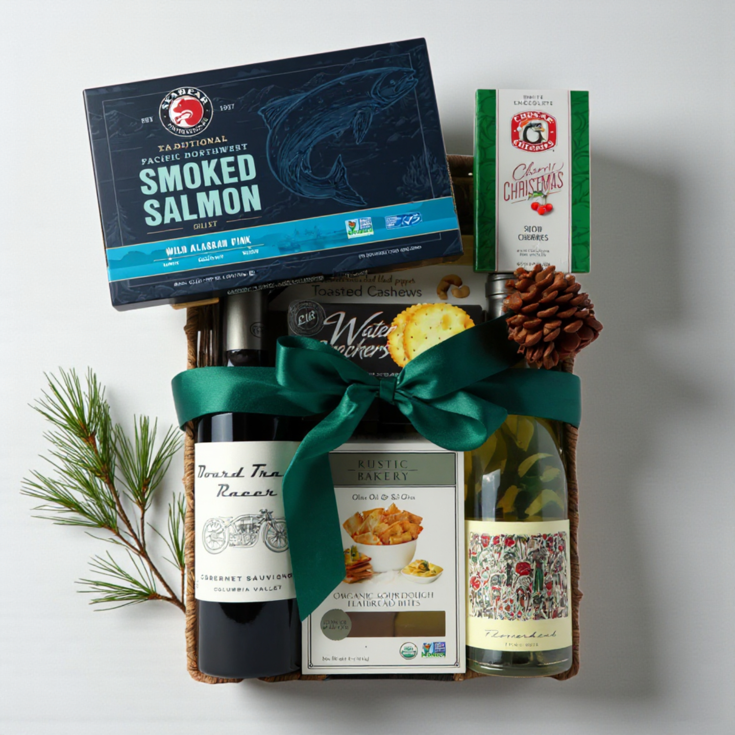 the best wine Gift basket with smoked salmon, wine, and other items on a white background
